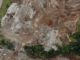Maquinaria pesada trabajando en una zona de extracción de áridos en la región de Aysén bajo investigación